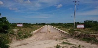 The property where public funds were spent on infrastructure.