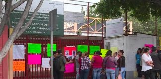 Parents outside the kindergarten where abuse allegedly occurred.