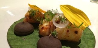 Corn tortilla with hoja santa, lobster, chorizo, beans and chile verde at Pujol.