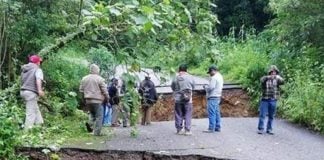 Highway damage caused by heavy rains has cut off 10 communities in Oaxaca.