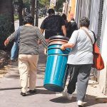 Mexico City residents stock up on water containers.