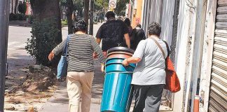 Mexico City residents stock up on water containers.