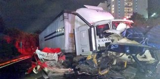 The semi amid crumpled cars after yesterday's accident.