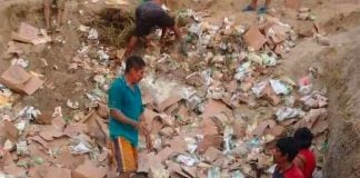 Residents inspect food packages dumped by family services agency.