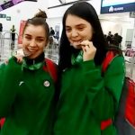 History-making medalists Navarro and Flores.