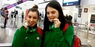 History-making medalists Navarro and Flores.