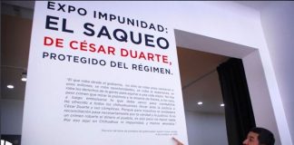 Governor Corral at the Impunity Expo exhibition in Mexico City.