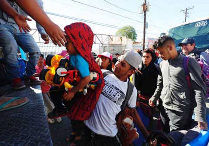 Migrants en route to Tijuana from Mexicali yesterday.