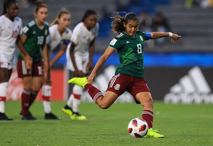 Mexico's captain takes a penalty kick that scored the game's only goal.