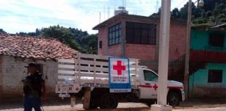 A Red Cross truck at the scene of yesterday's shooting in Guerrero.