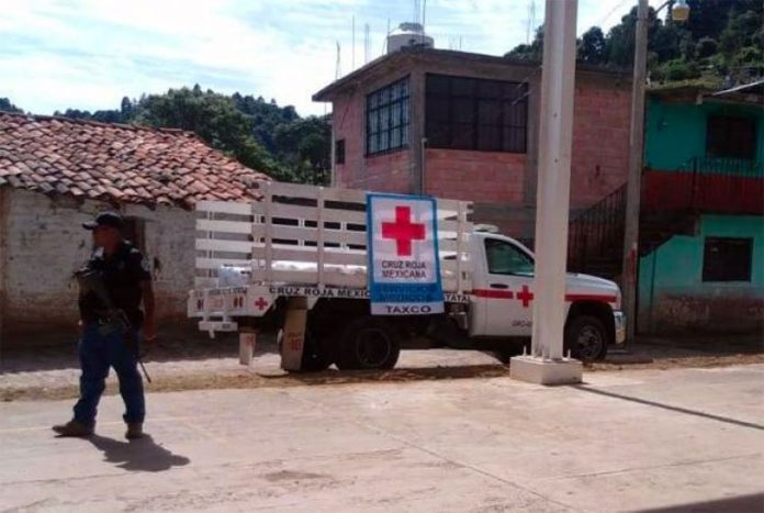 A Red Cross truck at the scene of yesterday's shooting in Guerrero.