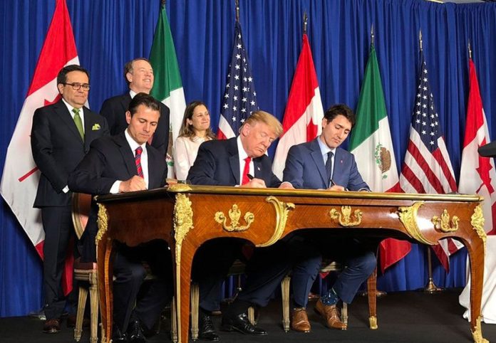 Peña Nieto, Trump and Trudeau sign the new agreement this morning in Argentina.