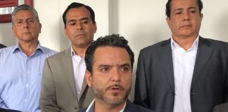 Villalobos, foreground, fears for his life.