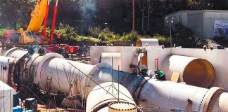 Workers carry out maintenance on Mexico City's water system.