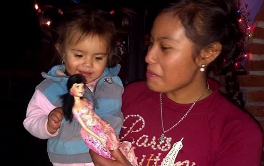 Mother and daughter get a Barbie doll in Oconahua, Jalisco.