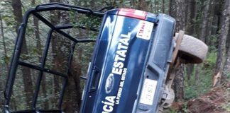 Police vehicle in Almoloya after ambush.