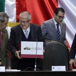 Urzúa, second from left, presents his budget on Saturday.