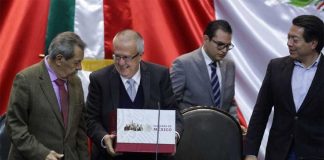 Urzúa, second from left, presents his budget on Saturday.