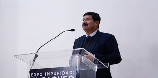 Governor Corral speaks at the inauguration of "Impunity Expo," which a judge has ordered closed.