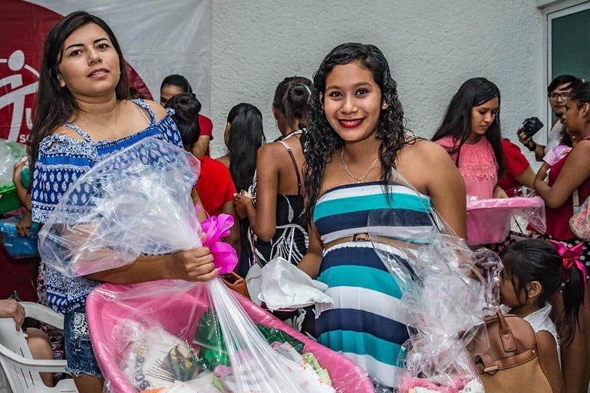 Expectant mothers and their gift packs.