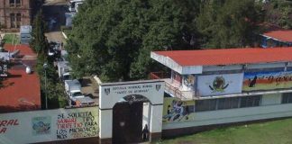 Hijacked trucks can be seen on the grounds of the Michoacán school.