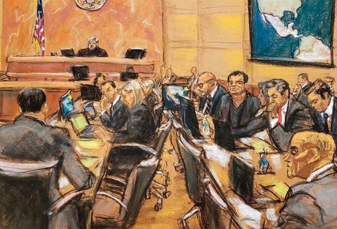 The New York trial of former drug lord 'El Chapo' Guzmán, seated just to the left of the map on the wall.