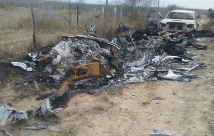 Burned trucks at the scene of Tamaulipas battle.