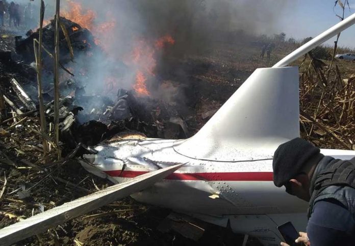 The helicopter shortly after it crashed December 24 in Puebla.