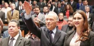 Mexico's new chief prosecutor takes the oath of office.