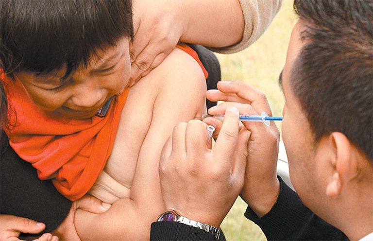 Ouch: an unhappy flu shot recipient.