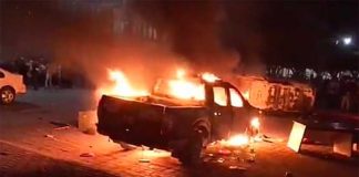 Police vehicle burns in Tepalcingo.