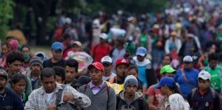 Migrants leave Mexico City this morning.