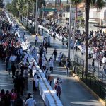 The world's longest rosca de reyes runs up one side of the boulevard and down the other.