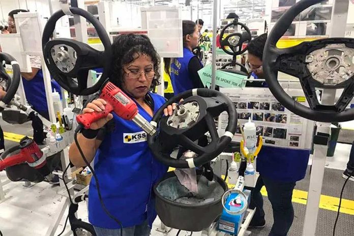 A worker at an automotive factory in Tamaulipas.
