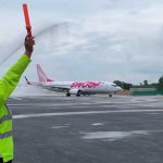 Swoop's inaugural flight to Cancún is baptized on arrival.