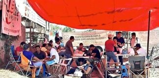 Teachers camp on the railroad tracks in Michoacán.