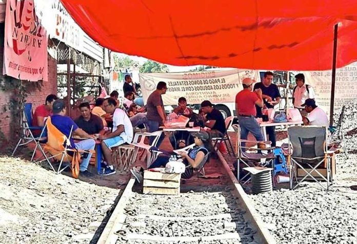 Teachers camp on the railroad tracks in Michoacán.