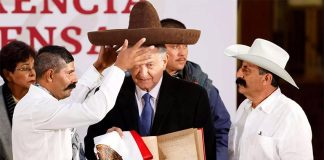 Descendants of Zapata present the president with a sombrero.