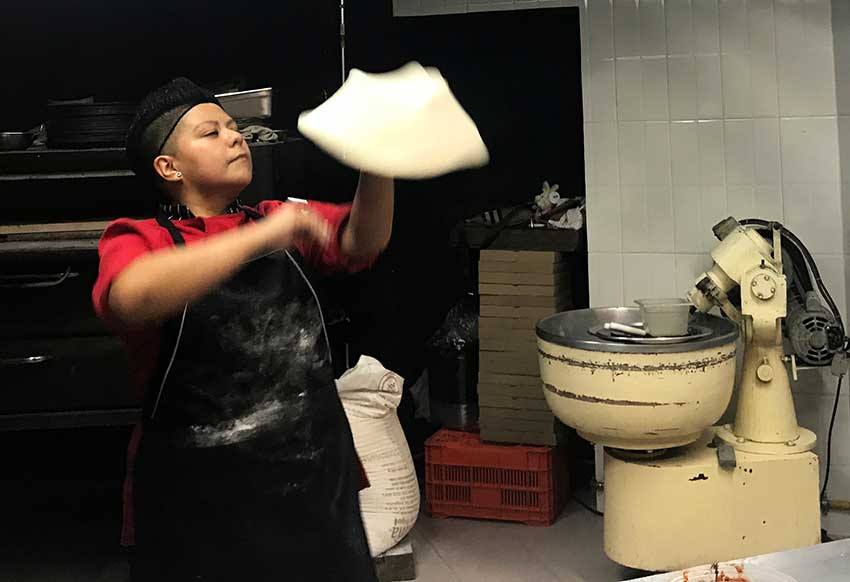 Pizza chef Angélica de la O at work.