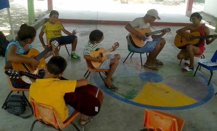 Guitar students at Zihuatanejo's school of music.
