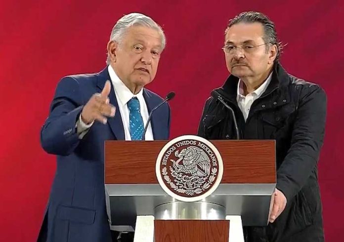 The president, left, and Pemex boss Romero speaking at this morning's press conference.