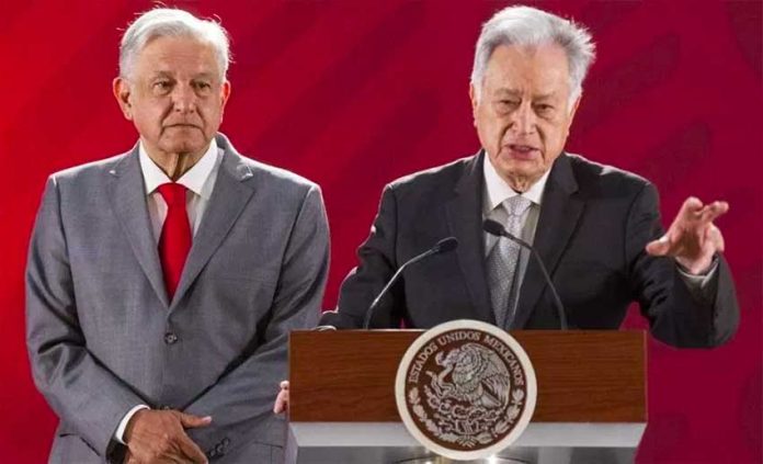 AMLO, left, and Bartlett at this morning's press conference.