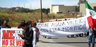 Demonstrators protest against Mexicali brewery.