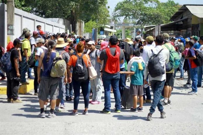 Migrants arrive yesterday in Chiapas.