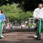 Grin scooter users flash grins.