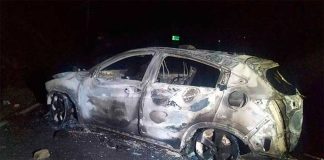 One of three burned vehicles after last night's lynching in Veracruz.