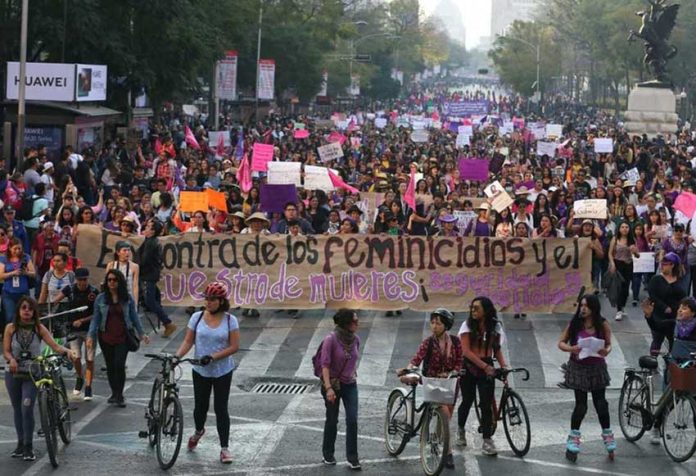 Marchers in Mexico City yesterday protest femicides and kidnappings.