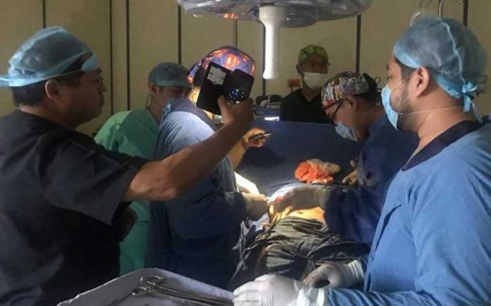 Cell phones light up operating room.