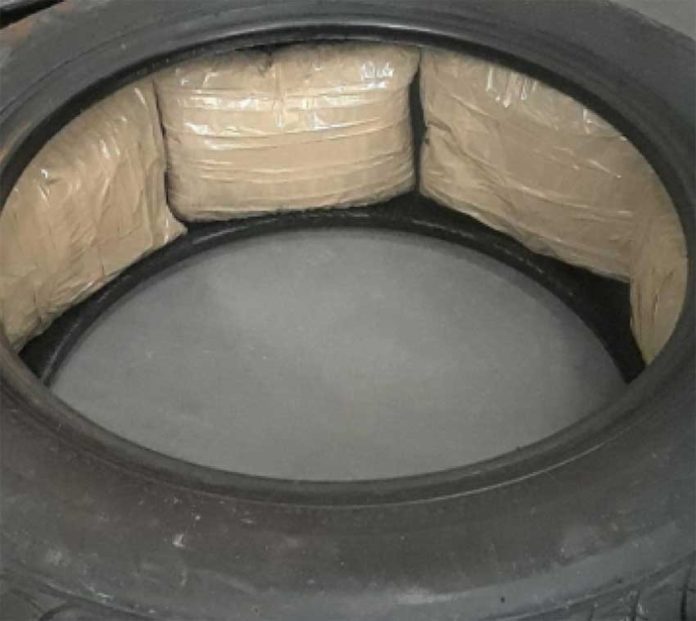 A spare tire containing meth, found inside a new Ford.