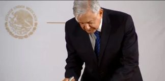 The president signs a pledge not to run for re-election.